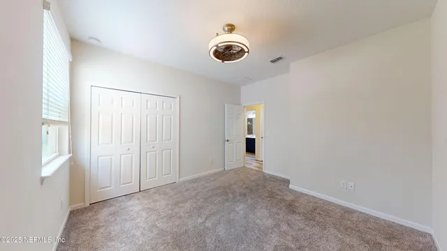 an empty room with window