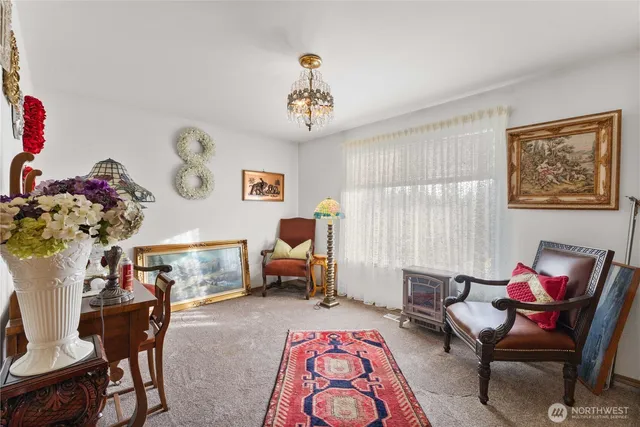 a living room with furniture and a table