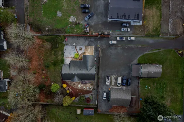 an aerial view of a house with outdoor space