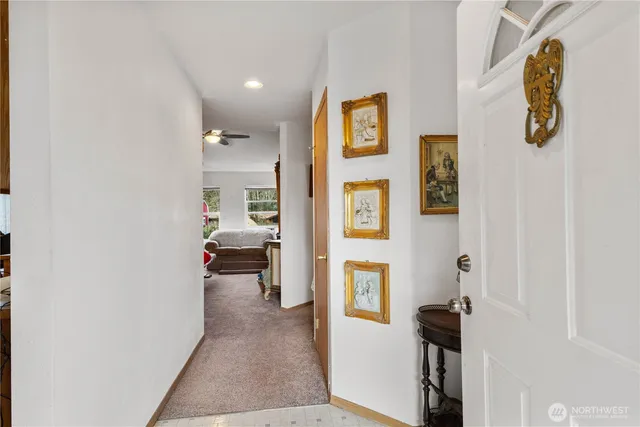 a view of a bedroom from a hallway