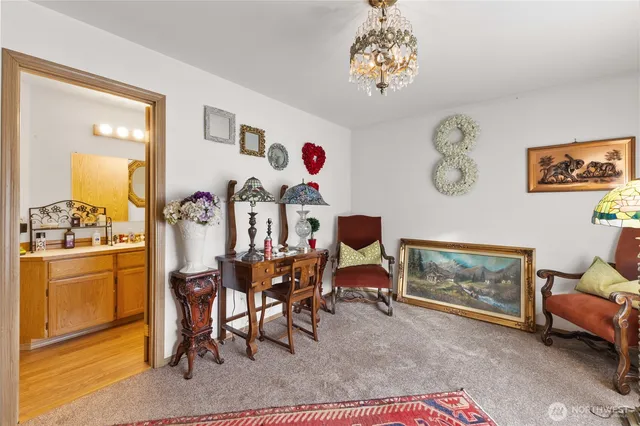 a living room with furniture and a table