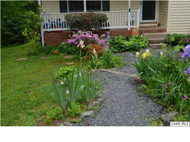 78 Dandelion Road Ruckersville, VA 22968 - Photo 9 of 11 a view of a backyard with plants