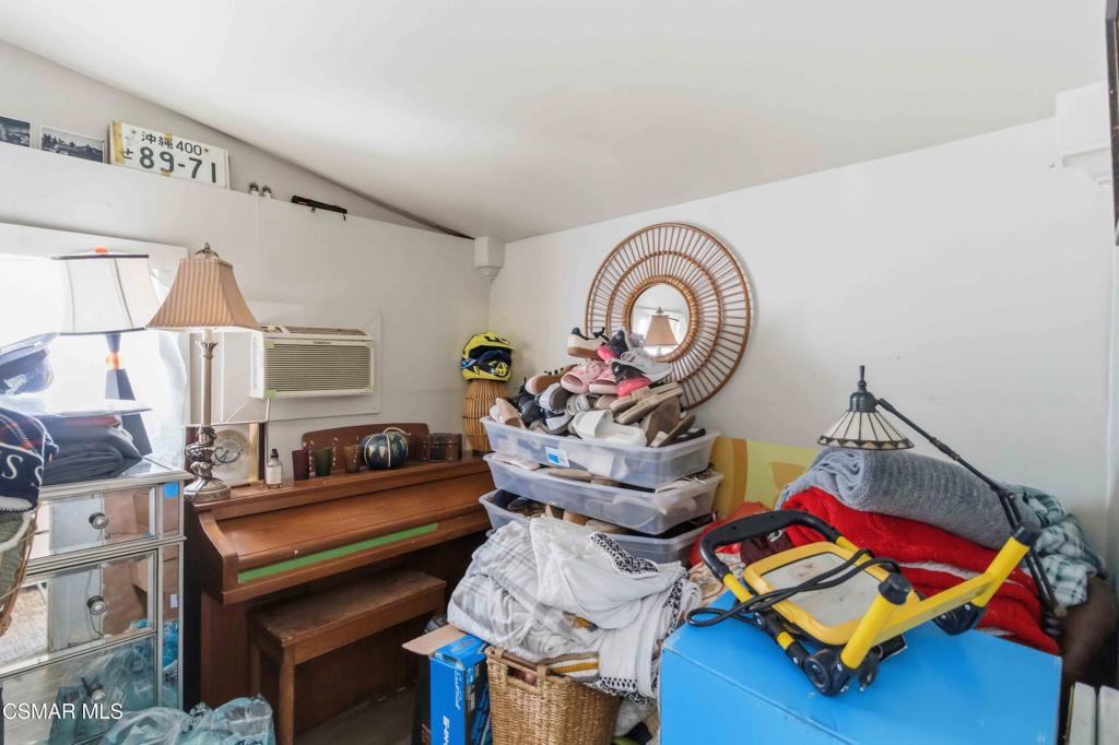 2874 School Street Simi Valley, CA 93065 - Photo 12 of 48 a living room with furniture and a clock