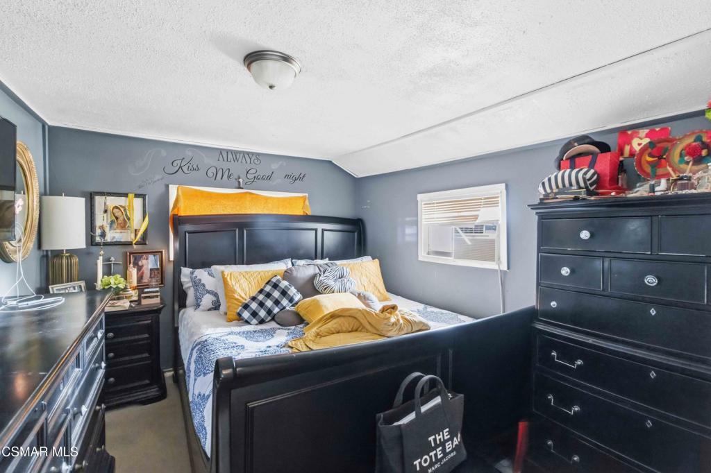 2874 School Street Simi Valley, CA 93065 - Photo 16 of 48 a bed room with a bed and a television