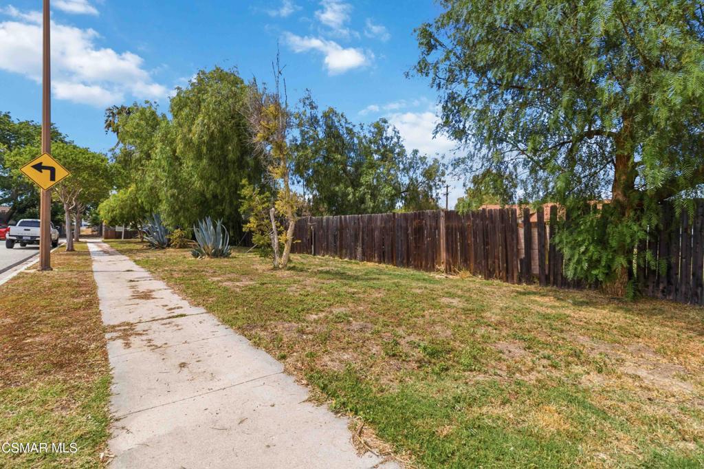 2874 School Street Simi Valley, CA 93065 - Photo 23 of 48 a backyard of a house with table and chairs