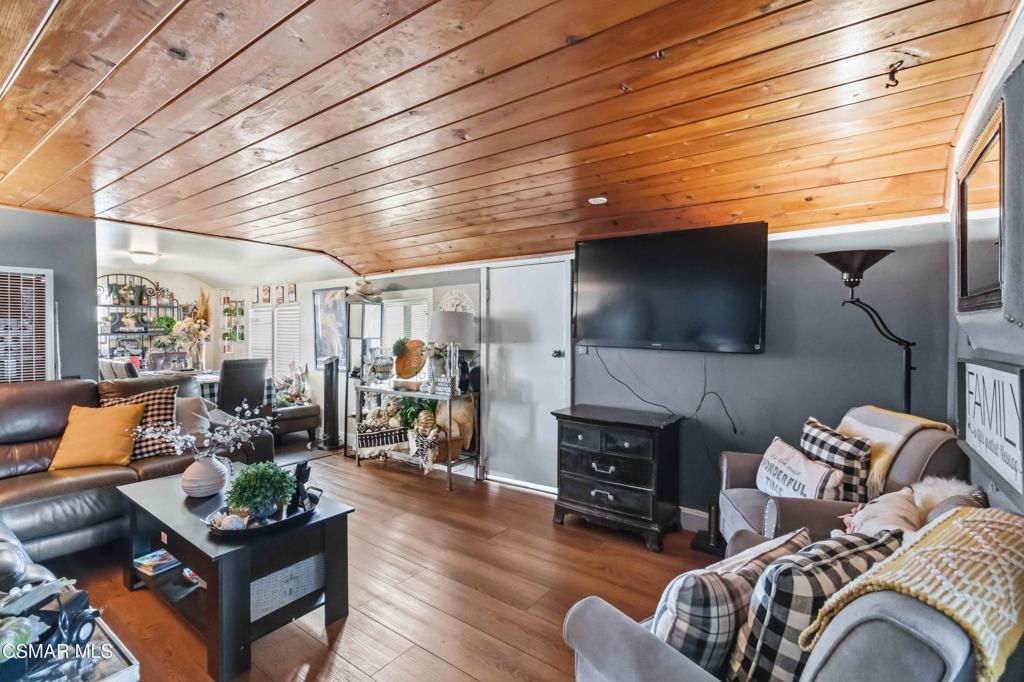 2874 School Street Simi Valley, CA 93065 - Photo 3 of 48 a living room with furniture and a flat screen tv