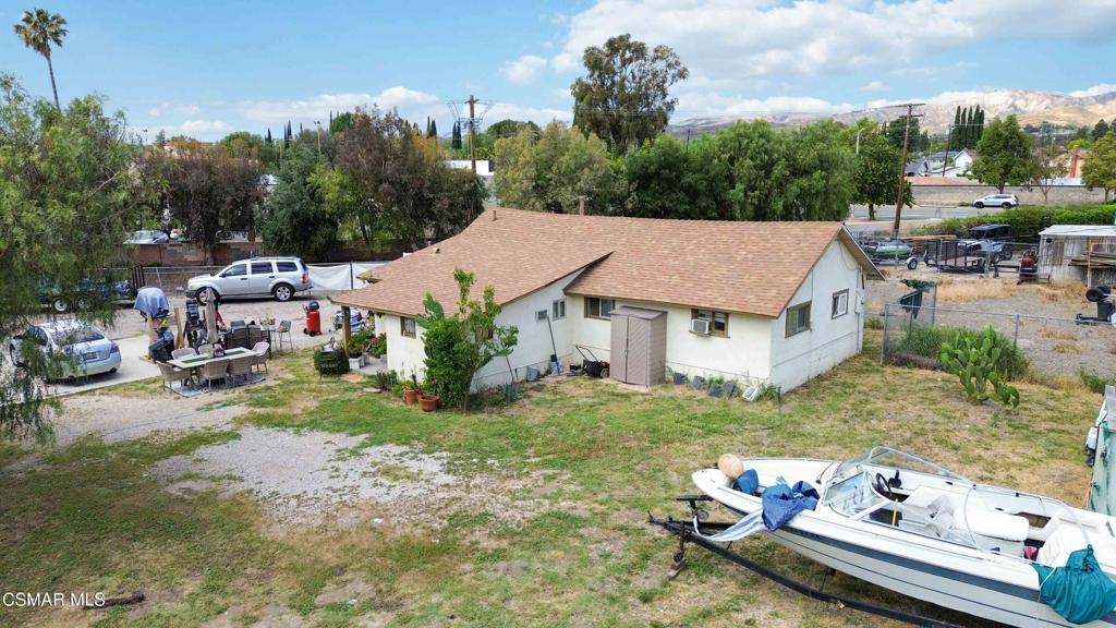 2874 School Street Simi Valley, CA 93065 - Photo 34 of 48 a aerial view of a house with a yard patio and fire pit