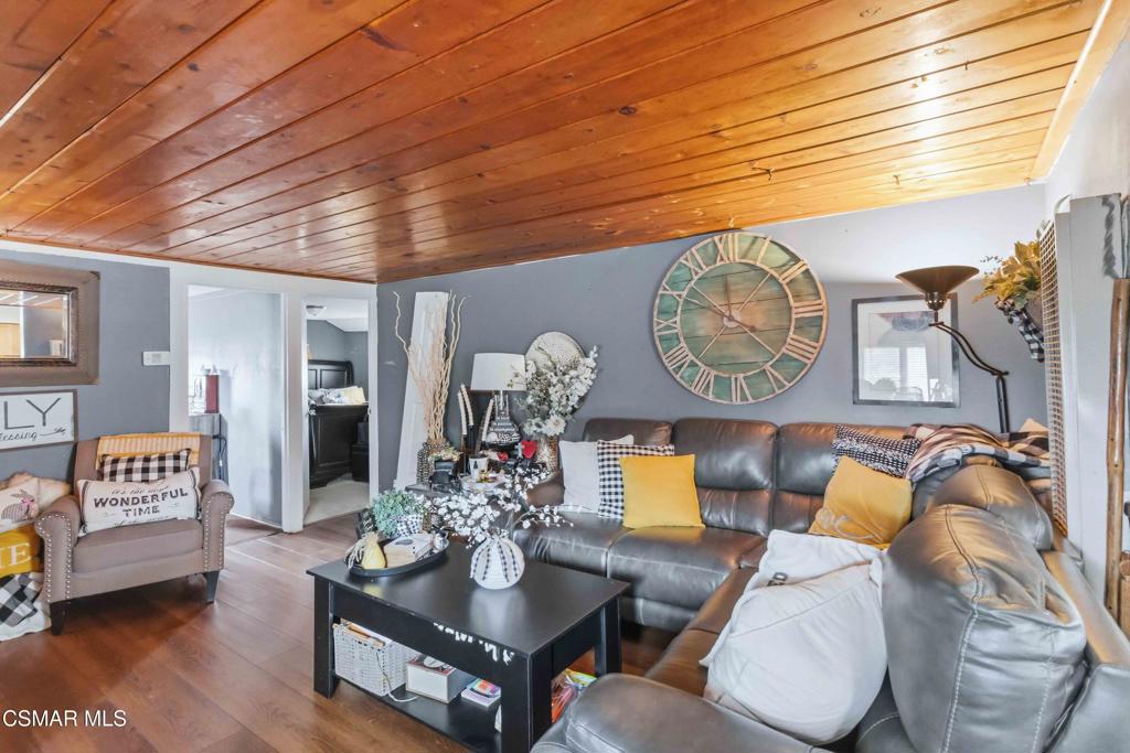 2874 School Street Simi Valley, CA 93065 - Photo 4 of 48 a living room with furniture and a table