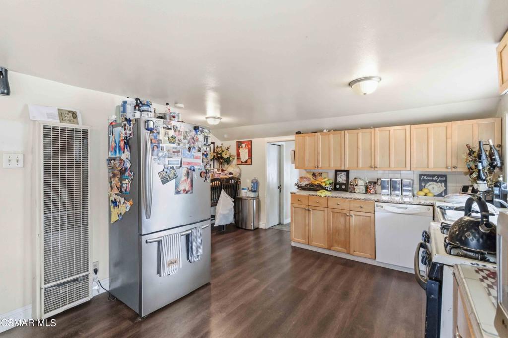 2874 School Street Simi Valley, CA 93065 - Photo 8 of 48 a kitchen with cabinets and wooden floor