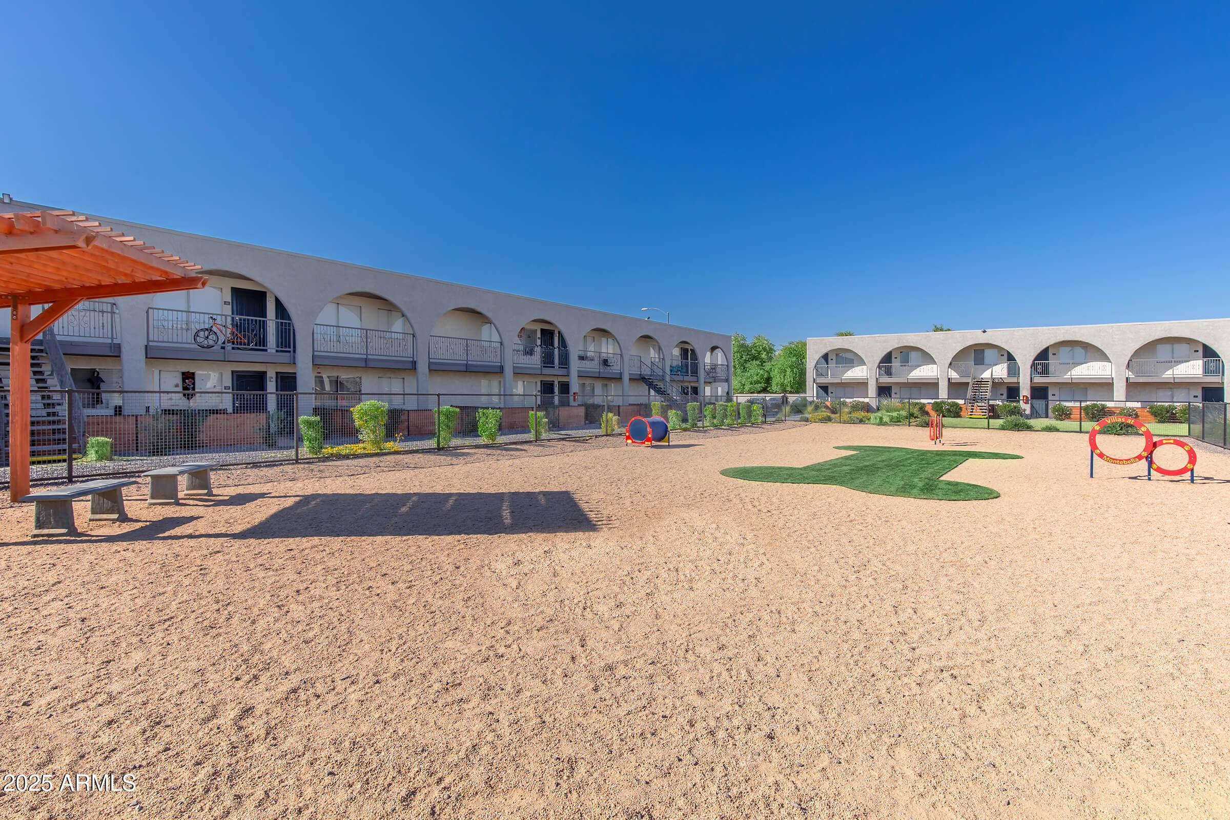 10860 North 85th Avenue, Unit 2 Peoria, AZ 85345 - Photo 14 of 16 a view of building with outdoor space