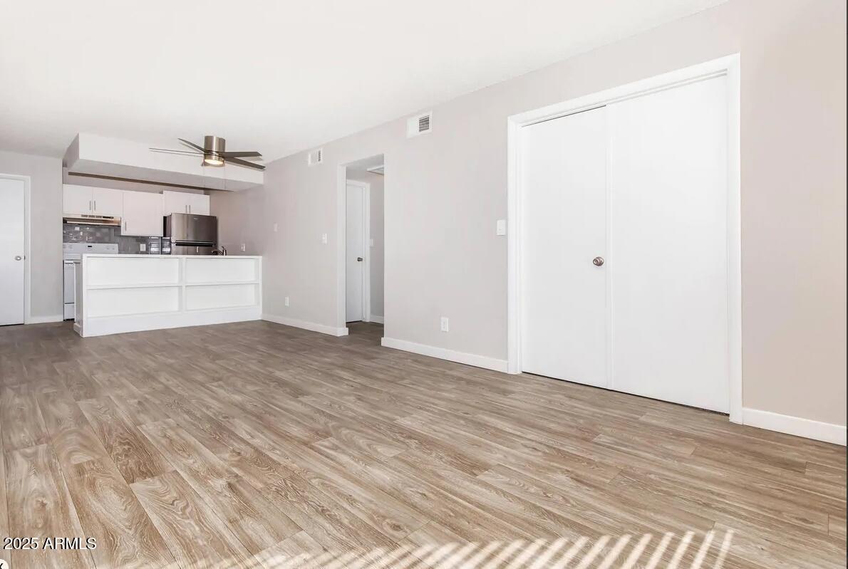 10860 North 85th Avenue, Unit 2 Peoria, AZ 85345 - Photo 3 of 16 a view of a kitchen with a sink