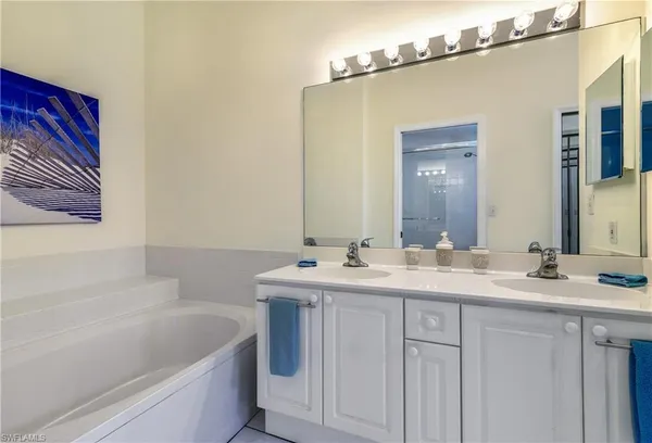 a bathroom with a sink and a bathtub