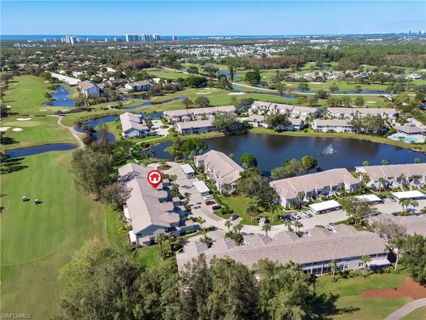an aerial view of lake and city