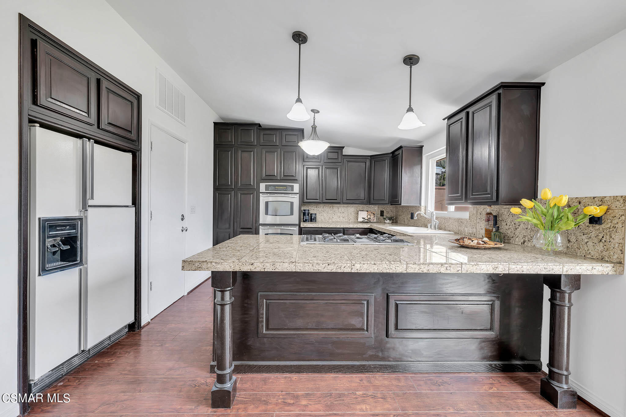 538 Mountaincrest Road Duarte, CA 91010 - Photo 10 of 63 a kitchen with stainless steel appliances granite countertop a sink a refrigerator and a stove