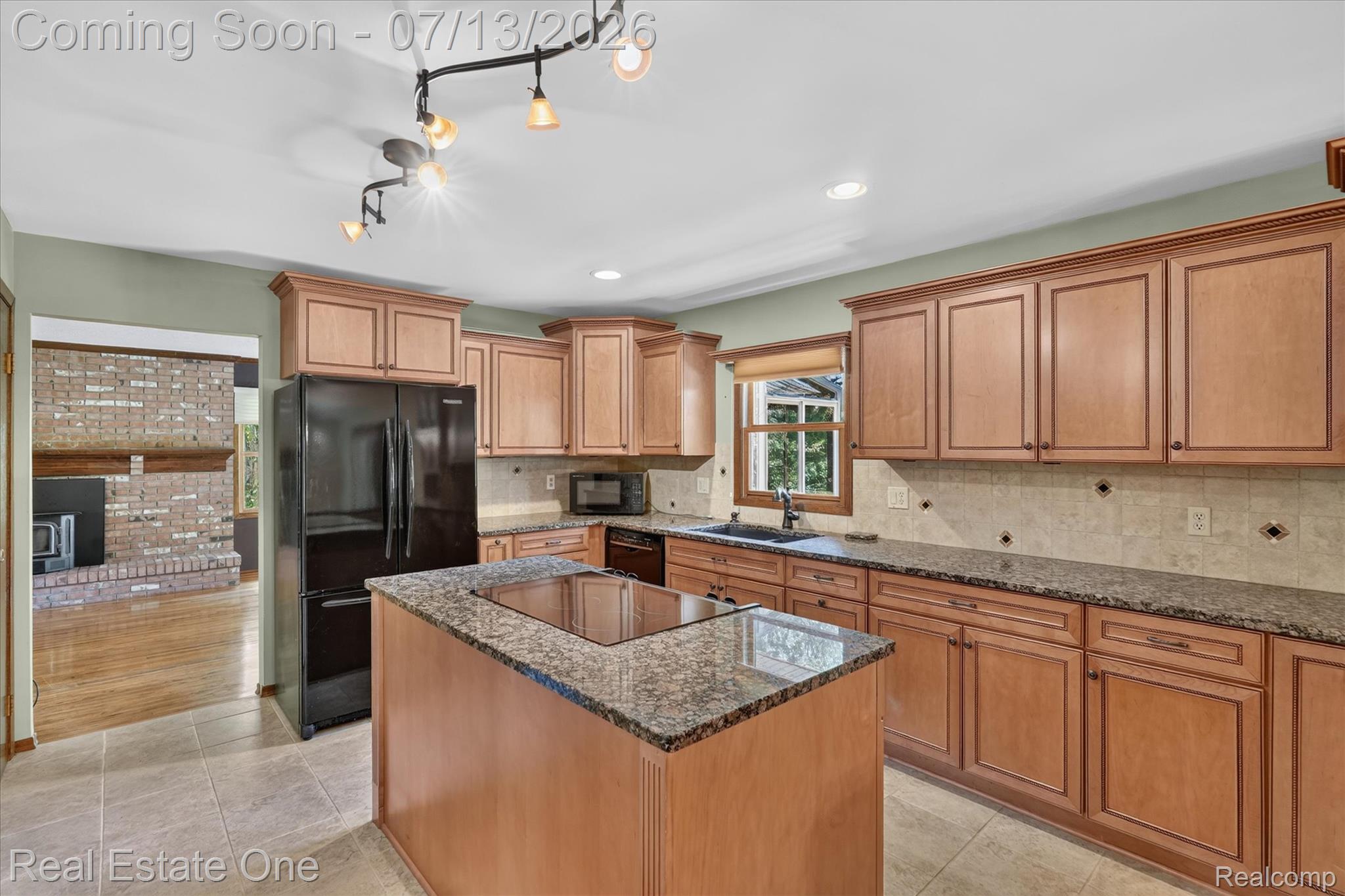 6039 Fish Lake Road Holly, MI 48442 - Photo 14 of 70 Granite countertops newer flooring and custom cabinets