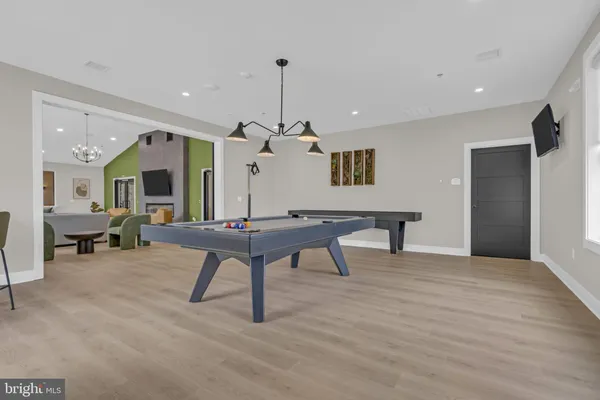 a view of a livingroom with furniture and window