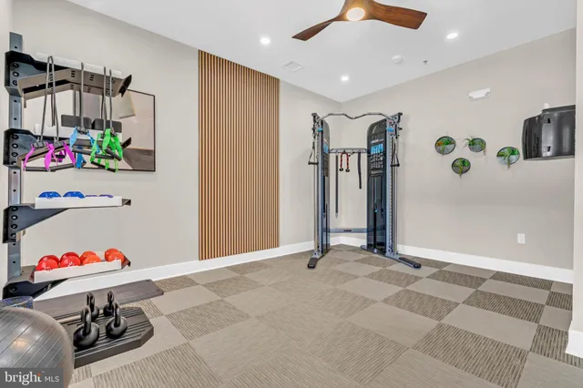 a room with a window and gym equipment