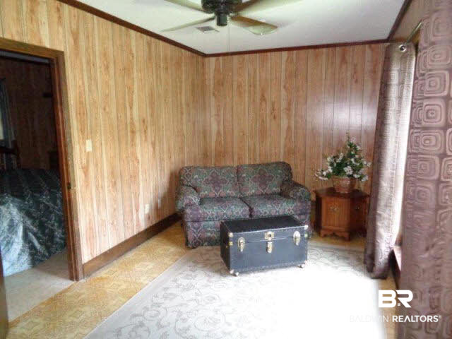923 Martinville Loop Atmore, AL 36502 - Photo 21 of 24 sitting area of guest suite