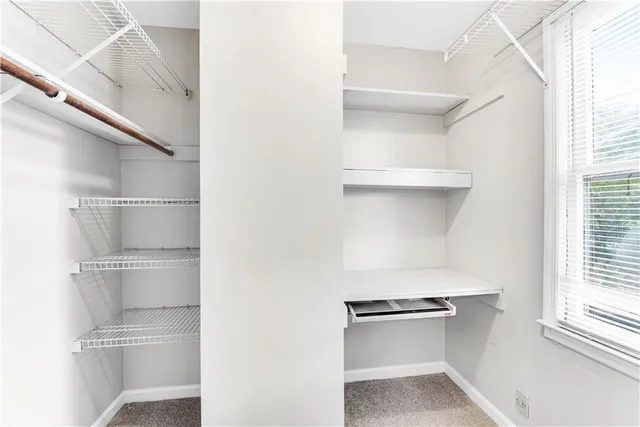 a kitchen with a cabinets and a stove