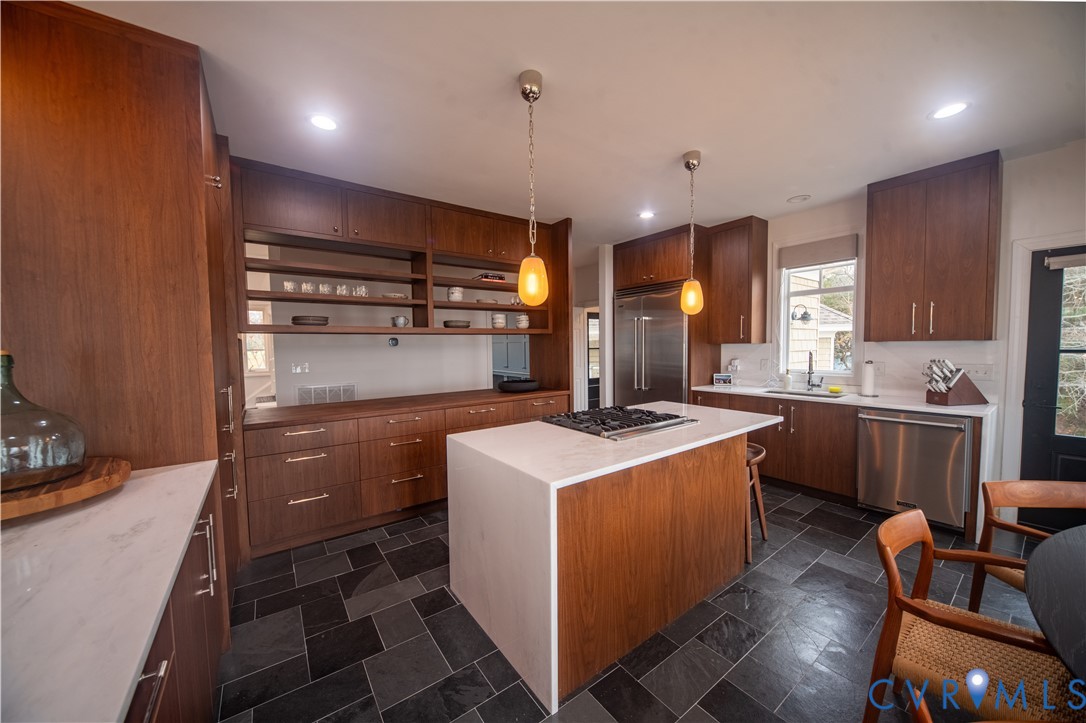 463 Rockingham Road Dunnsville, VA 22454 - Photo 15 of 47 a kitchen with a sink appliances and cabinets