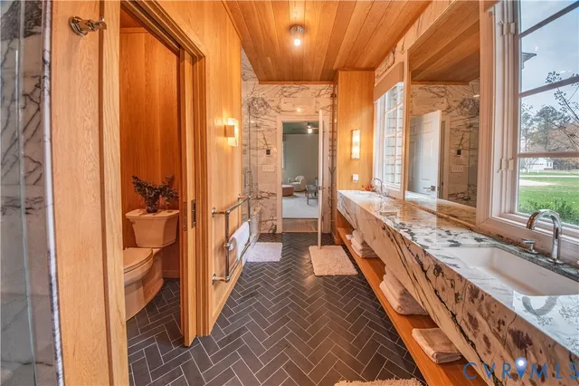 a bathroom with shower and a bathtub