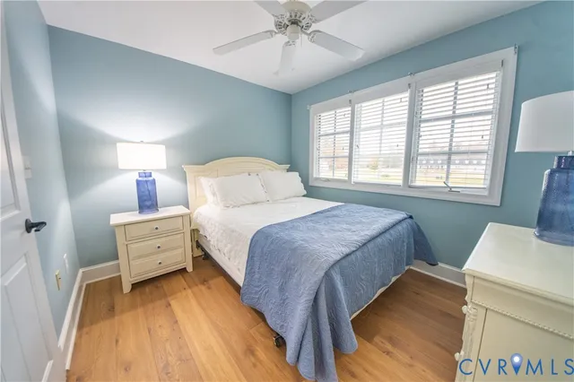 a bathroom with a double vanity sink mirror and shower