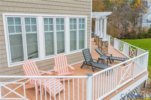 a view of balcony with furniture