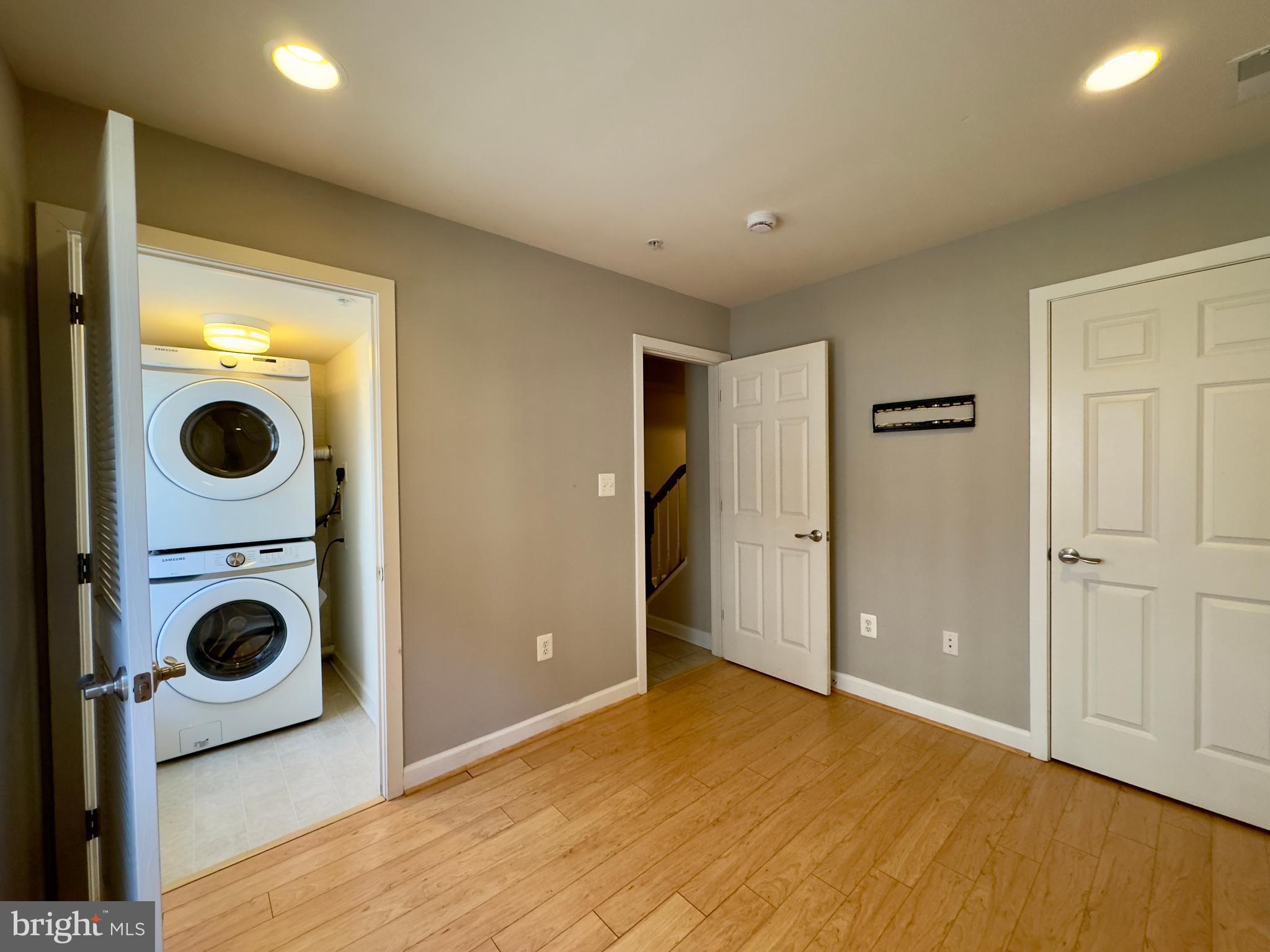 124 South Duncan Street Baltimore, MD 21231 - Photo 15 of 30 a view of a storage & utility room with washer and dryer