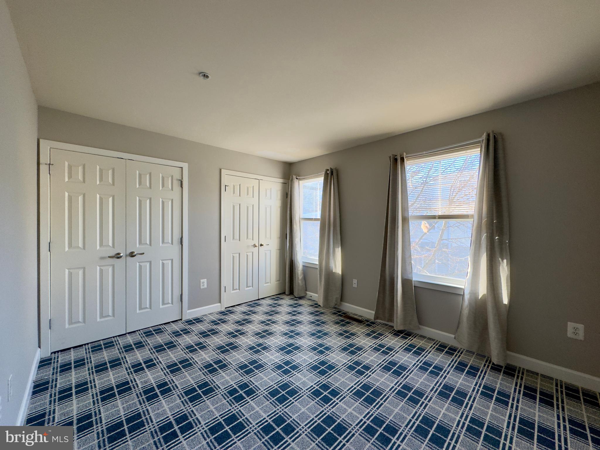 124 South Duncan Street Baltimore, MD 21231 - Photo 4 of 30 a bedroom with a bed and a window