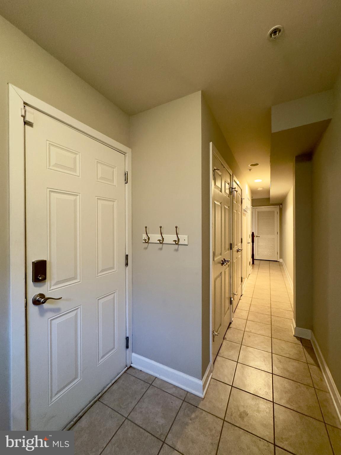 124 South Duncan Street Baltimore, MD 21231 - Photo 10 of 30 a view of a hallway with wooden shelves