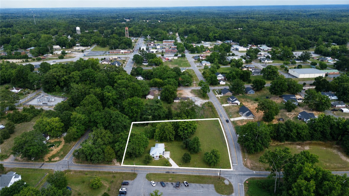 605 Hampton Street Iva, SC 29655 - Photo 16 of 16 An aerial perspective reveals a charming home nestled on a spacious lot within a verdant neighborhood.