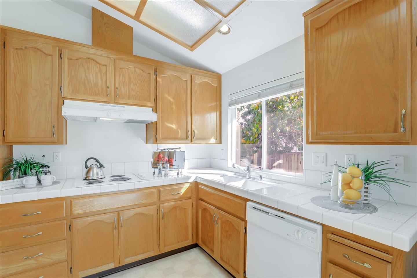 883 Marcella Street Livermore, CA 94550 - Photo 14 of 44 a kitchen with sink and window