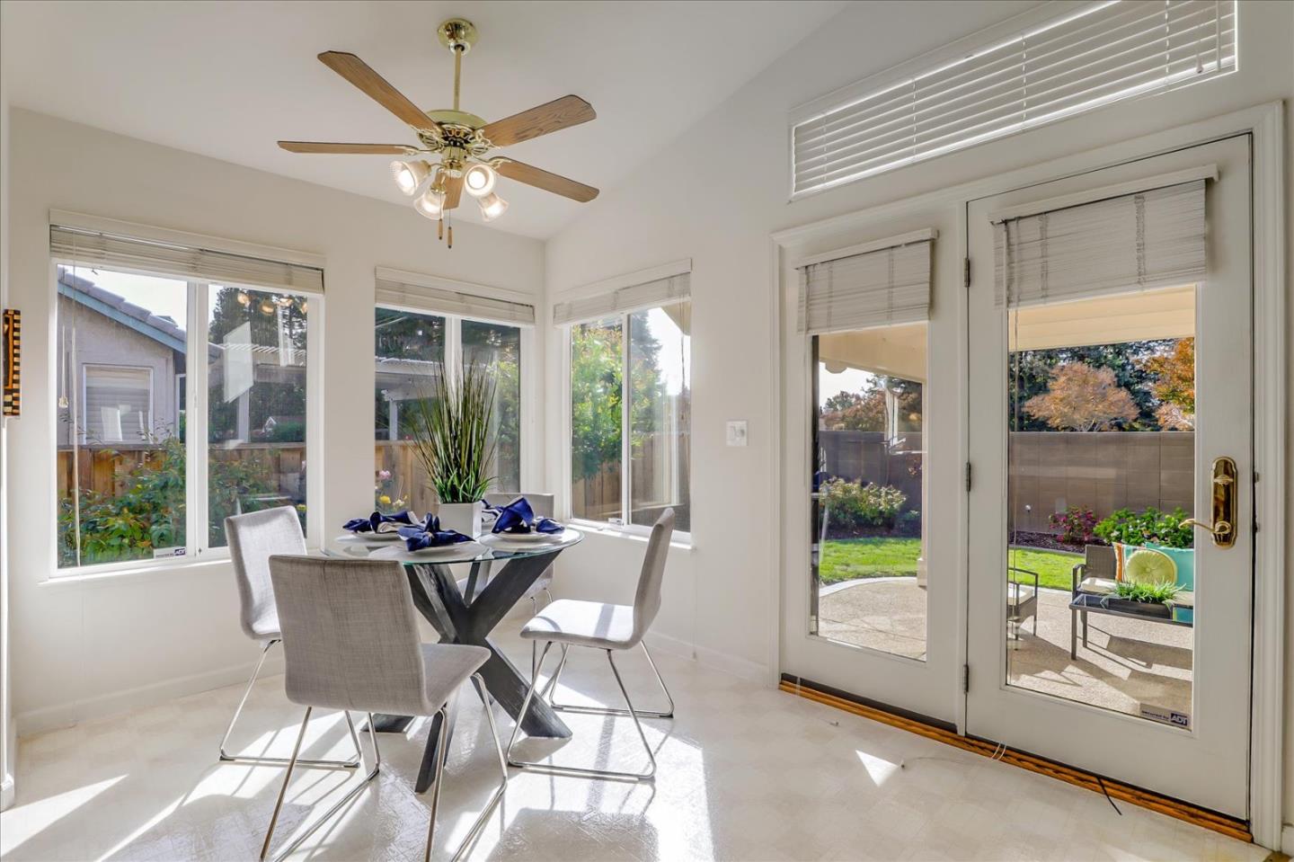 883 Marcella Street Livermore, CA 94550 - Photo 15 of 44 a dining room with furniture water view and a floor to ceiling window