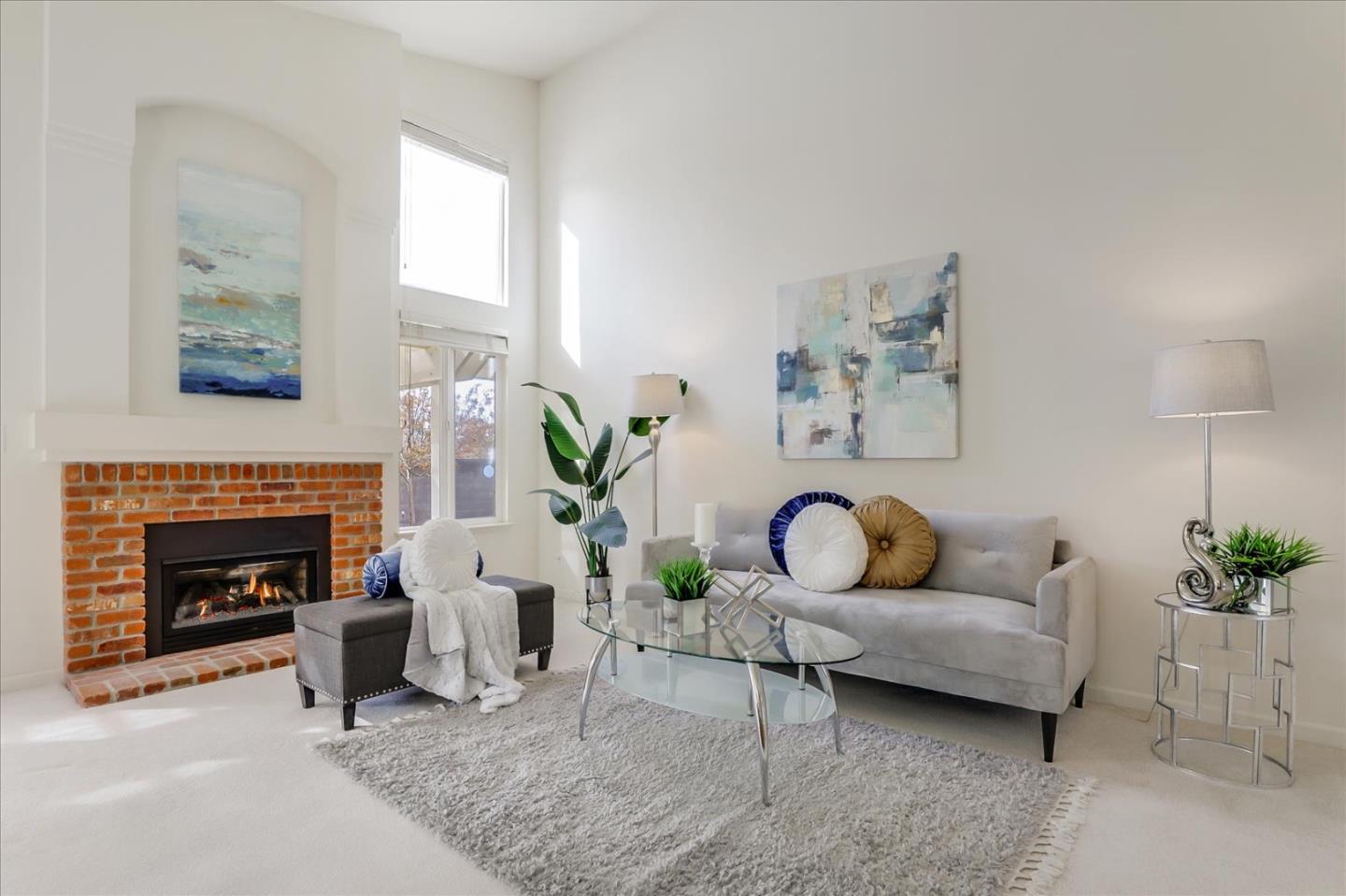 883 Marcella Street Livermore, CA 94550 - Photo 17 of 44 a living room with furniture and a fireplace
