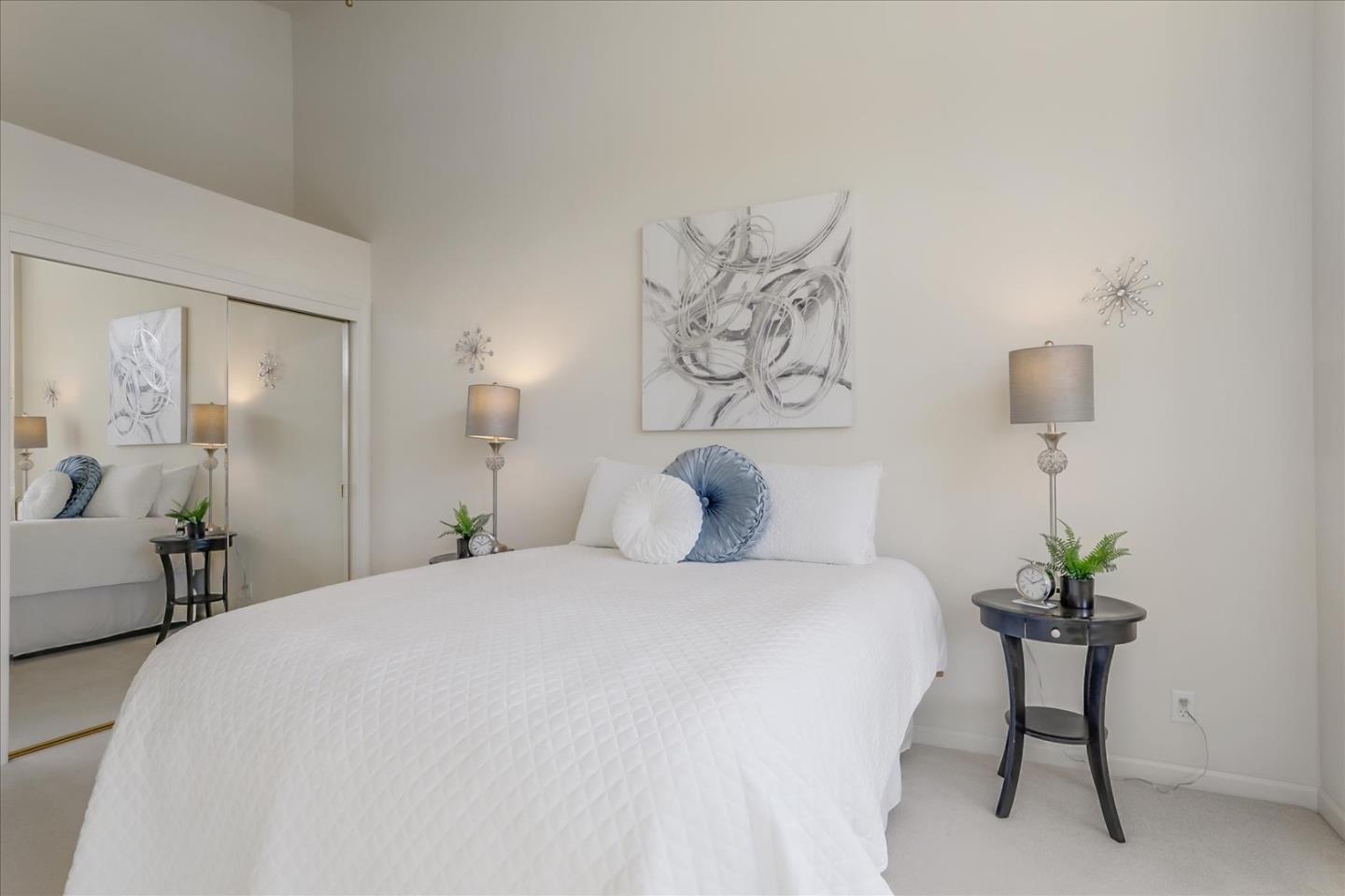 883 Marcella Street Livermore, CA 94550 - Photo 21 of 44 a bedroom with a bed and a table