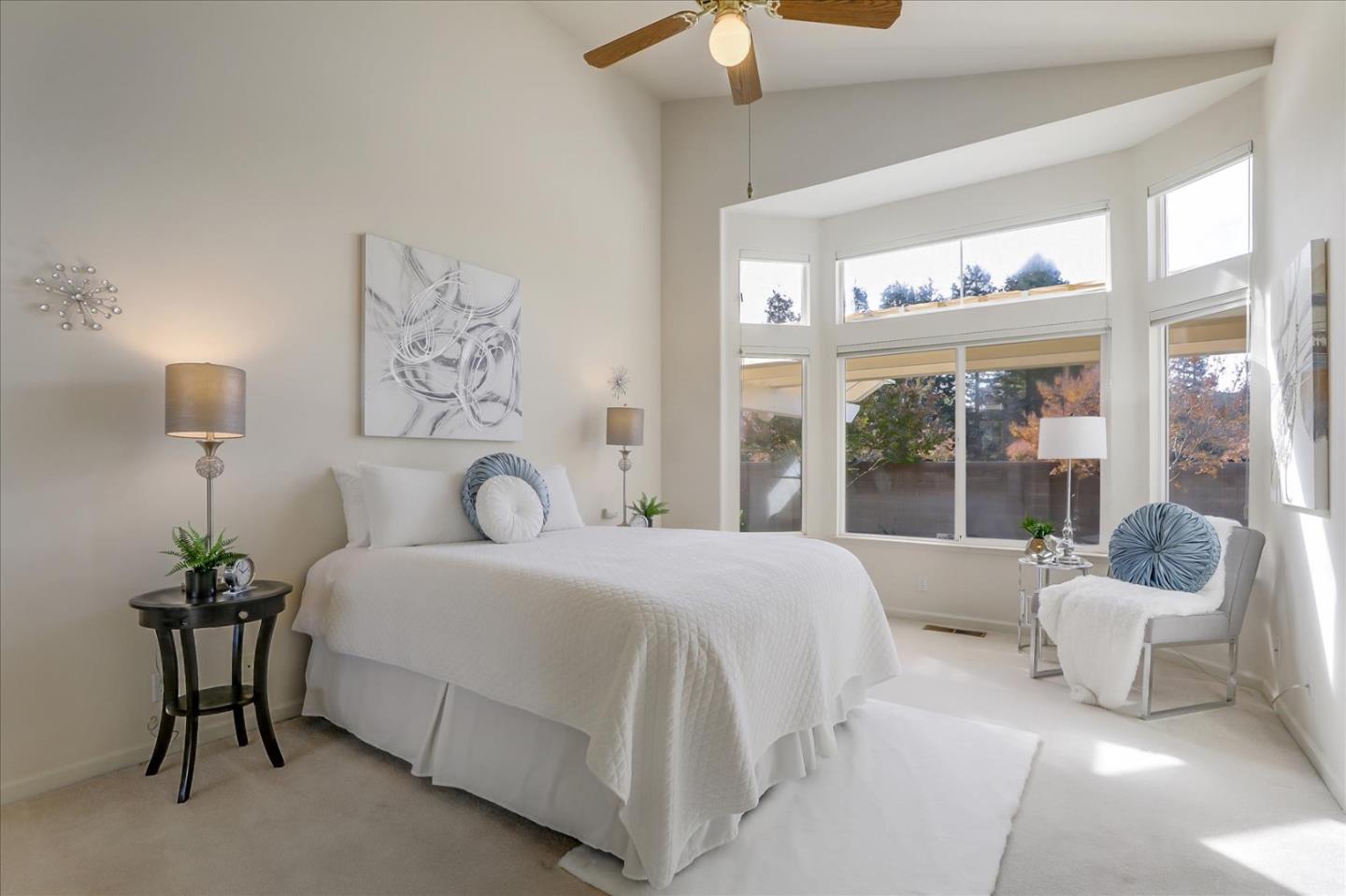 883 Marcella Street Livermore, CA 94550 - Photo 22 of 44 a bedroom with a bed and a large window