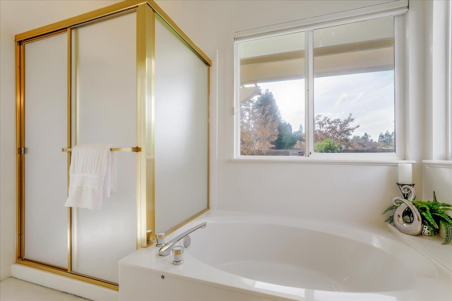 883 Marcella Street Livermore, CA 94550 - Photo 25 of 44 a bathroom with a bathtub and a shower