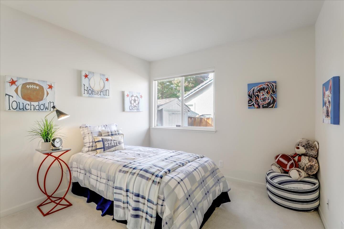 883 Marcella Street Livermore, CA 94550 - Photo 27 of 44 a bedroom with a bed and wall painting