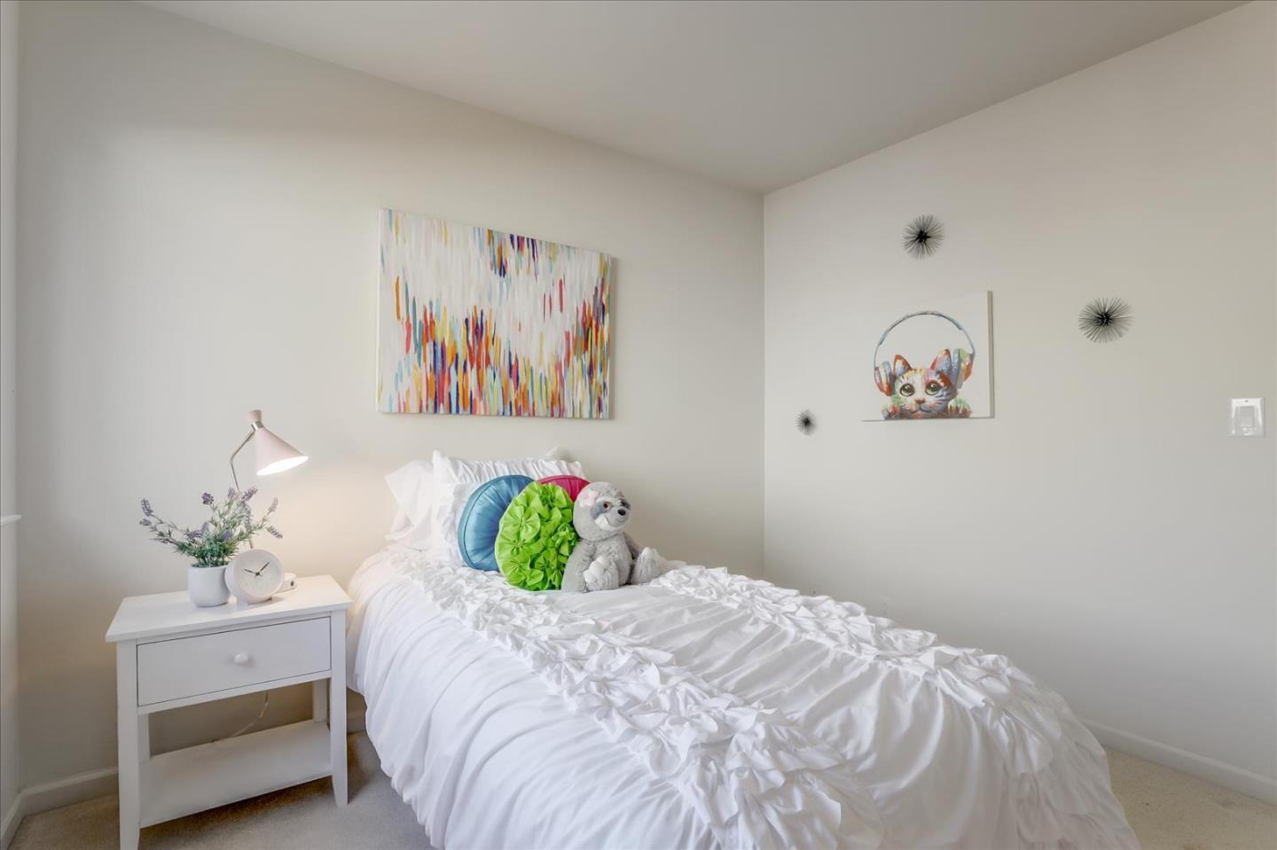 883 Marcella Street Livermore, CA 94550 - Photo 29 of 44 a bed room with a bed and a painting on the wall