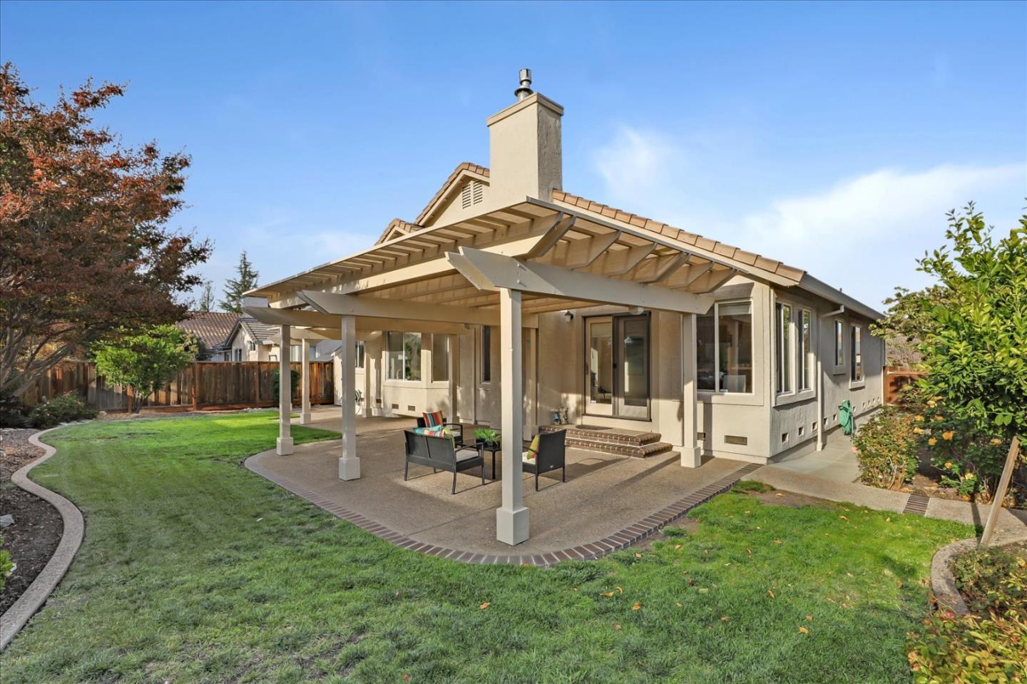 883 Marcella Street Livermore, CA 94550 - Photo 39 of 44 a view of a house with a yard porch and sitting area