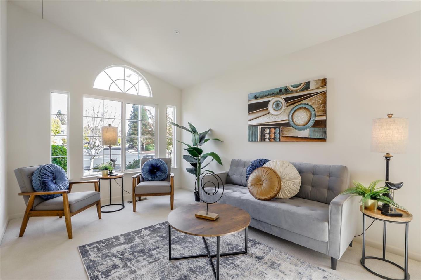 883 Marcella Street Livermore, CA 94550 - Photo 6 of 44 a living room with furniture and a large window