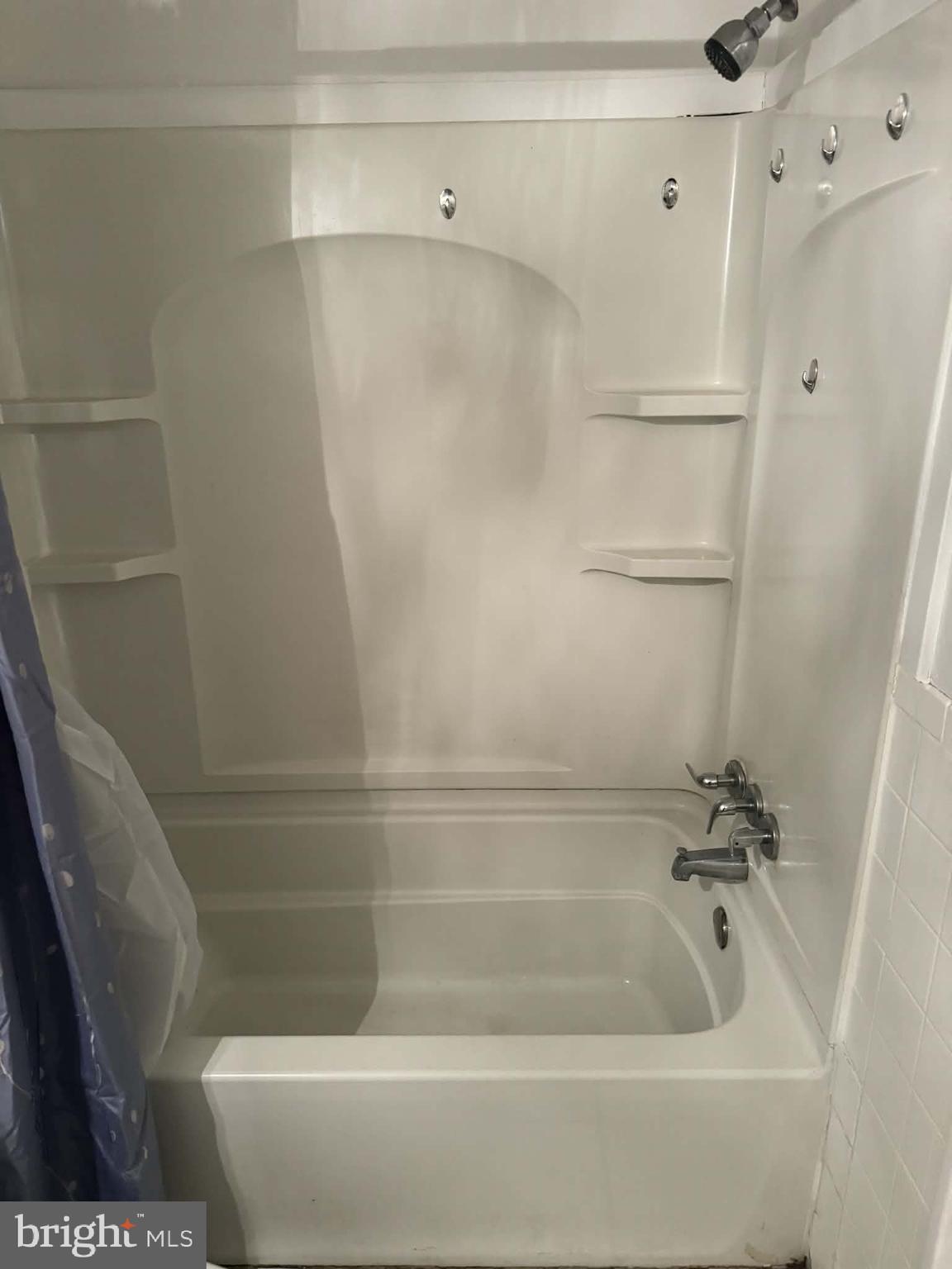 204 St Barnabas Road, Unit T Suitland, MD 20746 - Photo 10 of 10 a bathroom with a bathtub