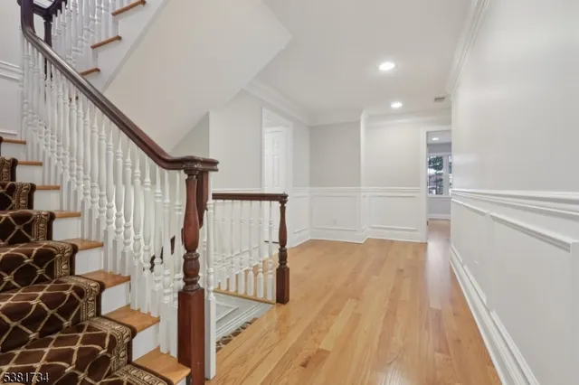 a view of entryway with wooden floor