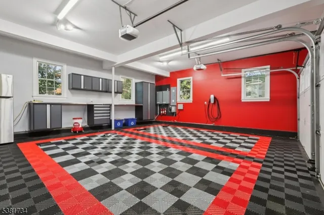 a very nice looking room with a rug and a fireplace