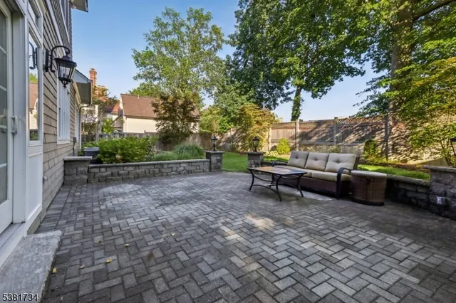 a view of a park with large trees
