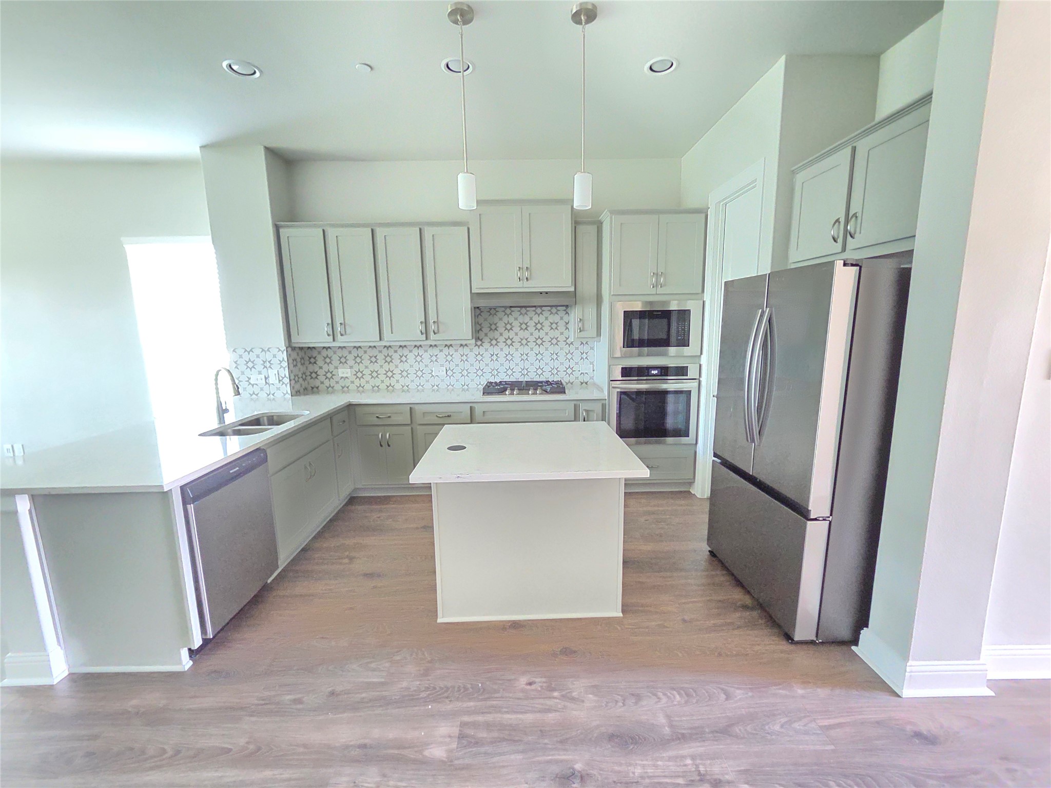 600 C-Bar Ranch Trail, Unit 121 Cedar Park, TX 78613 - Photo 10 of 32 Culinary dreams come alive in this well-appointed kitchen with stainless steel appliances and abundant counter space.
