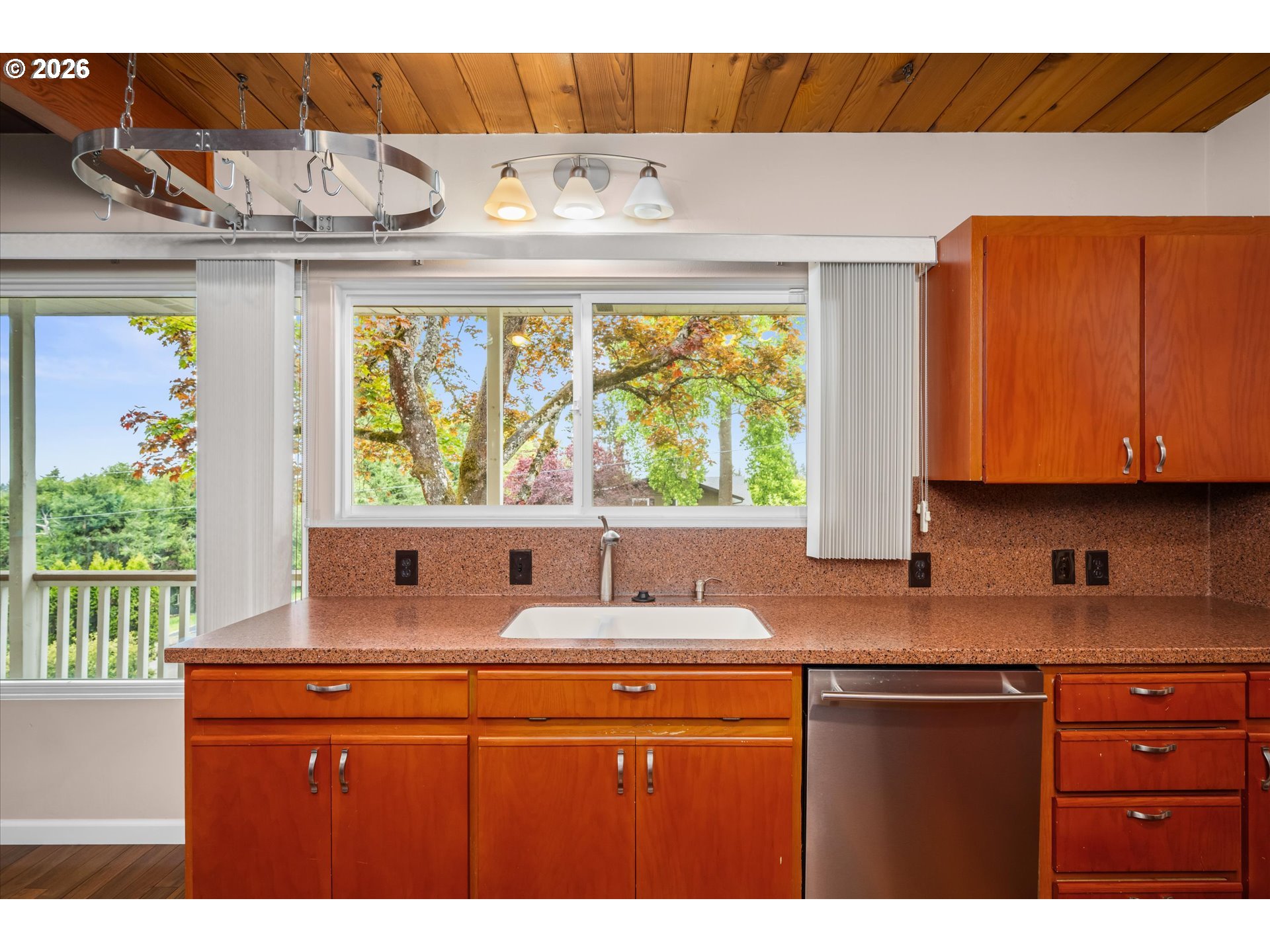 2012 Greiner Street Eugene, OR 97405 - Photo 16 of 45 a kitchen with stainless steel appliances granite countertop a sink and cabinets