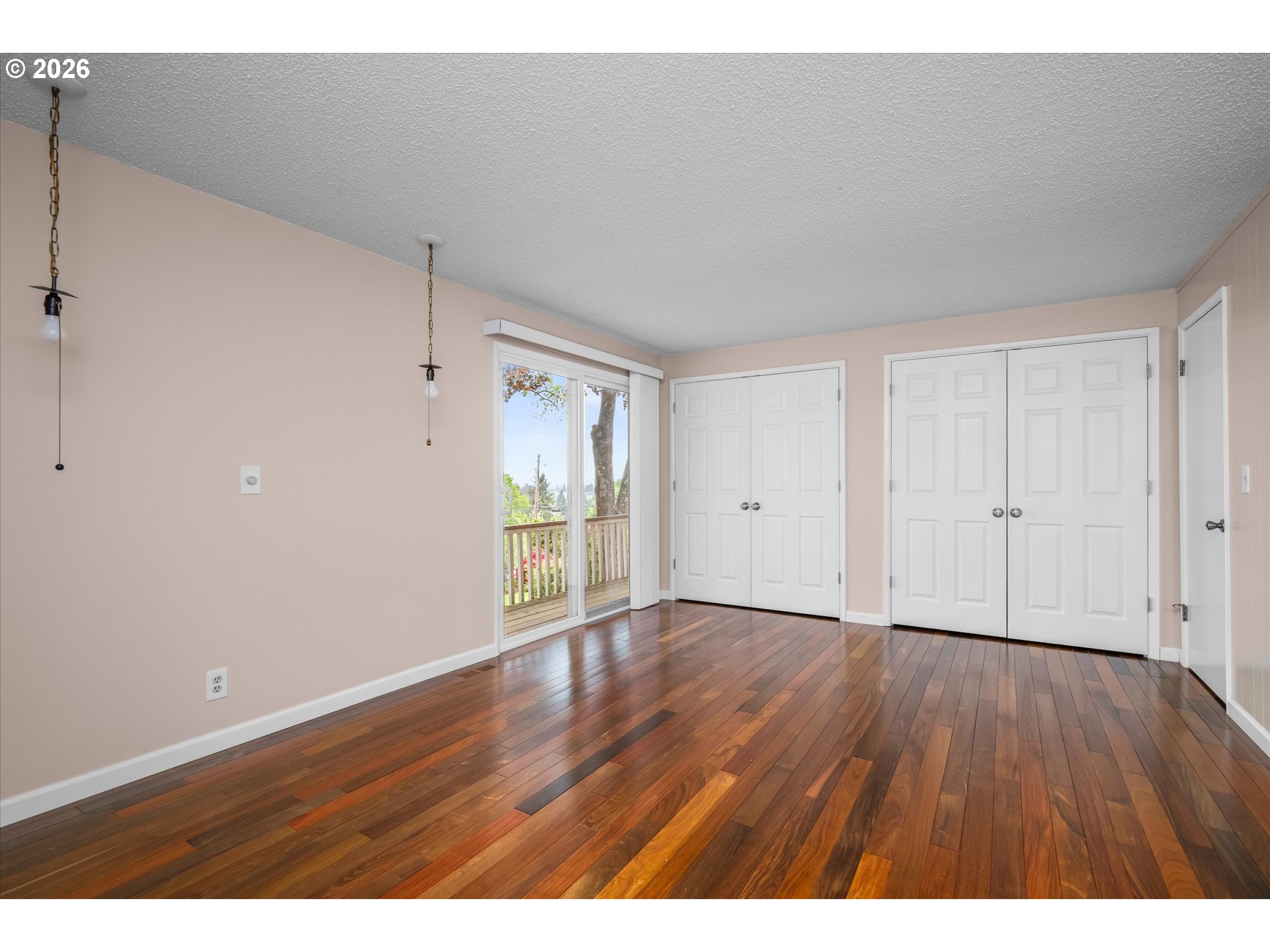 2012 Greiner Street Eugene, OR 97405 - Photo 18 of 45 a view of an empty room with wooden floor and a window