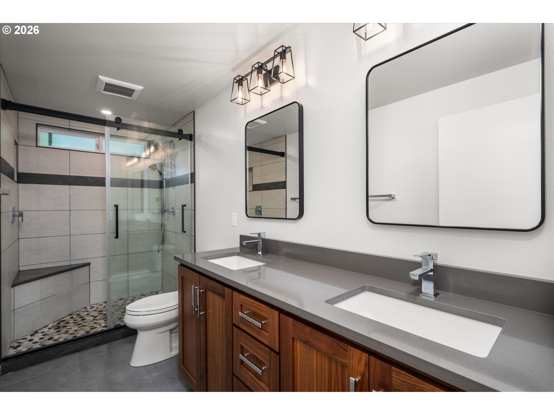 2012 Greiner Street Eugene, OR 97405 - Photo 19 of 45 a bathroom with a double vanity sink mirror and toilet