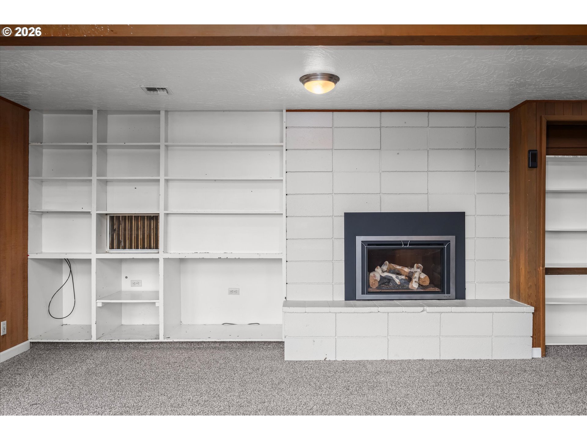2012 Greiner Street Eugene, OR 97405 - Photo 23 of 45 a living room with a fireplace